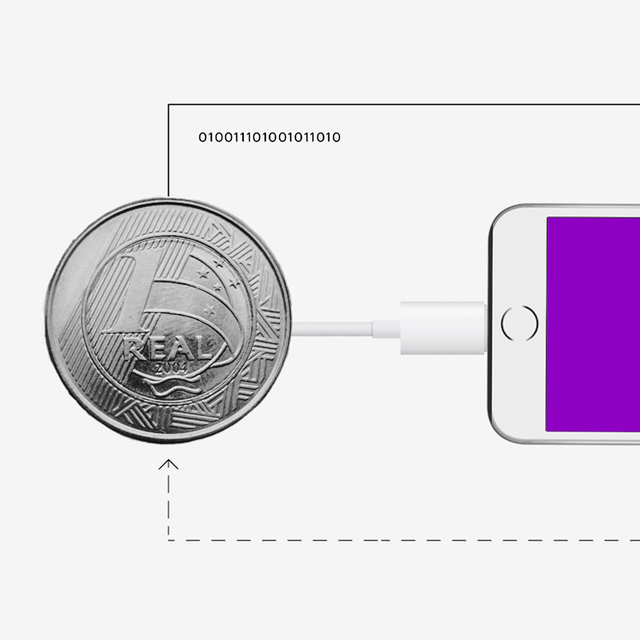 Uma moeda conectada a um aparelho celular com tela roxa.