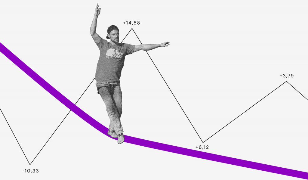 O que é bitcoin: homem se equilibrando em uma corda bamba e uma linha de gráfico subindo e descendo