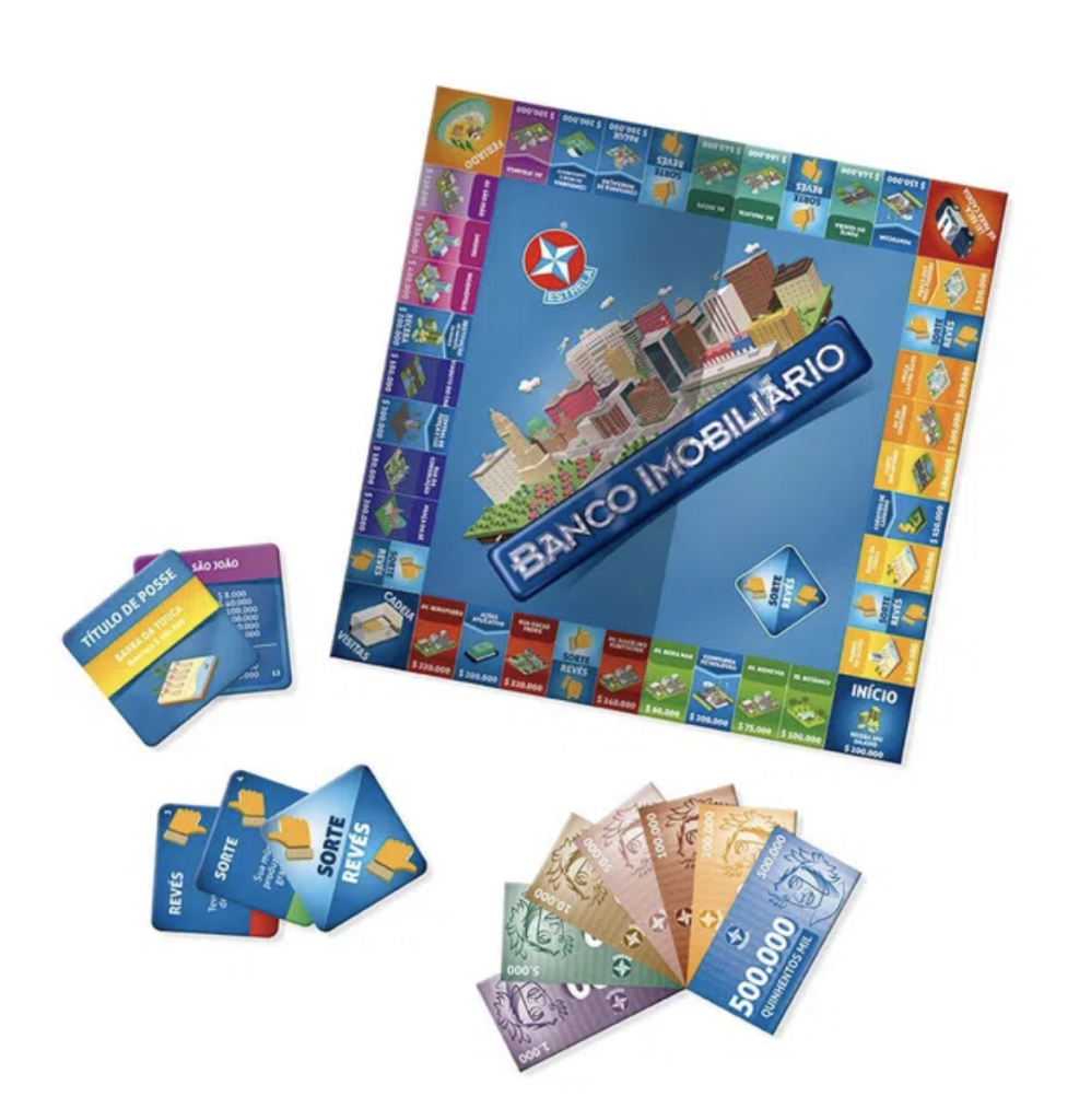 Aprender finanças com jogos: imagem do tabuleiro do jogo Banco Imobiliário, as notas e os cartões